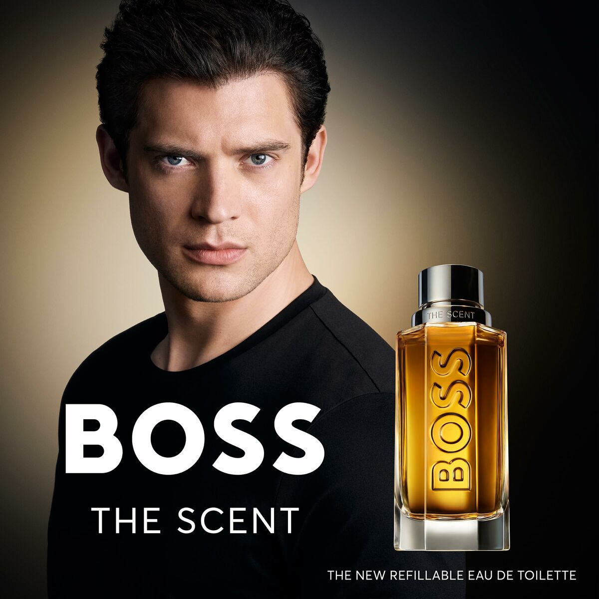 Hugo Boss THE SCENT 200 ml fragrance in front of male model, showcasing its sophisticated design and appeal.
